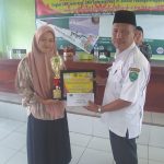 Ade Juwita Harahap yang berhasil memboyong Juara II Bidang Karya Tulis Ilmiah di Ajang Harmony Festival