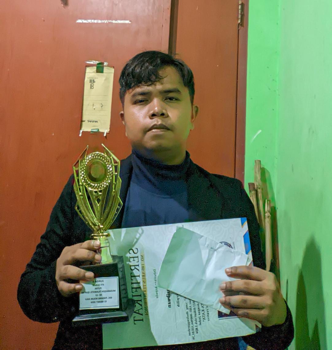 Riswandi Raih Juara 2 Karya Tulis Ilmiah Al-Quran (MMQ)