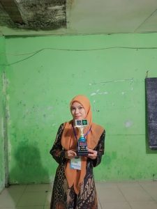 Juria Hasibuan yang berhasil meraih juara 3 Hadis Nabi Pada Acara Musabaqoh Tilawatil Qur’an (MTQ) Nasional